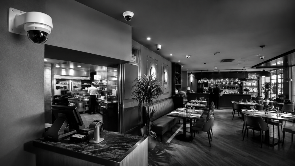 Restaurant security cameras monitoring dining areas, entrances, and kitchen operations
