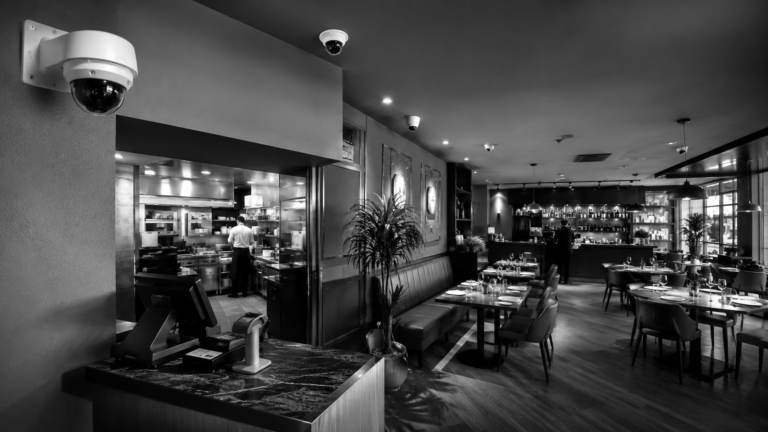 Restaurant security cameras monitoring dining areas, entrances, and kitchen operations
